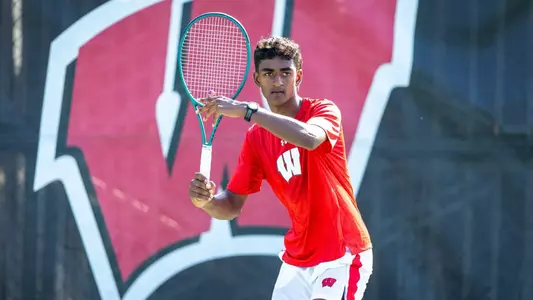 Sachiv Kumar prepares to return a serve