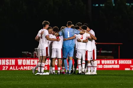 Men's soccer team pregame huddle