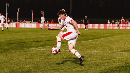 Raimbault settles the soccer ball