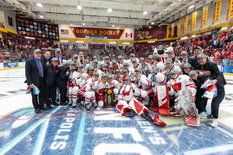 Wisconsin Badgers celebrate the NCAA college Women’s Frozen Four Final hockey game against the Ohio State Buckeyes, Sun., Mar. 23, 2025, in Minneapolis, Min. The Badgers won 4-3 in overtime. (Photo by David Stluka/Wisconsin Athletic Communications)