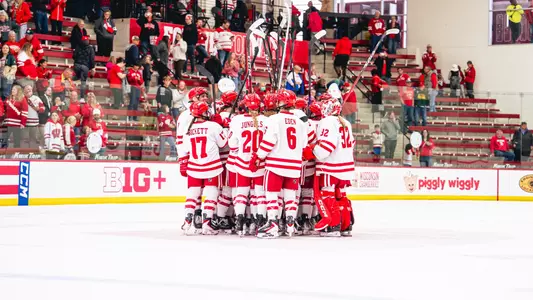 Badgers huddle against Minnesota Duluth on October 12th