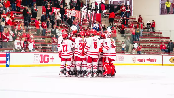 Badgers huddle against Minnesota Duluth on October 12th
