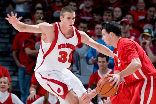 MADISON, WI - NOVEMBER 18: Guard John Leuer #30 of the Wisconsin Badgers defends against guard John Edmison #25 of the SIU-Edwardsville Cougars at the Kohl Center on November 18, 2008 in Madison, Wisconsin. Wisconsin beat SIU-Edwardsville 88-58. (Photo by David Stluka)