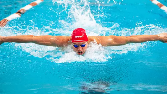 Dominik Mark Torok swims 200 fly at Texas Invite
