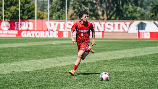 Roberto Burlew looks to pass