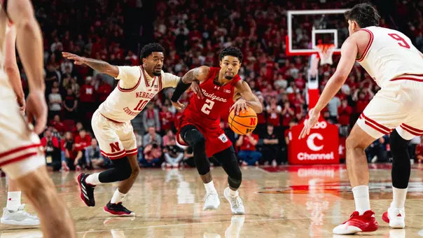 Nick Boyd drives through the lane against Nebraska