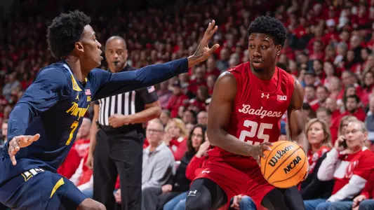 John Blackwell drives baseline against Marquette