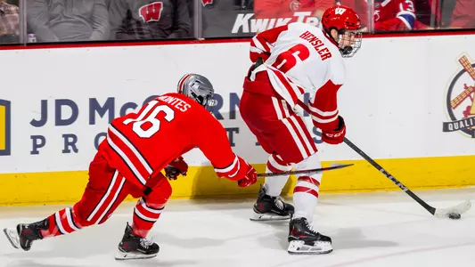 Logan Hensler skates against Ohio State at the Kohl Center