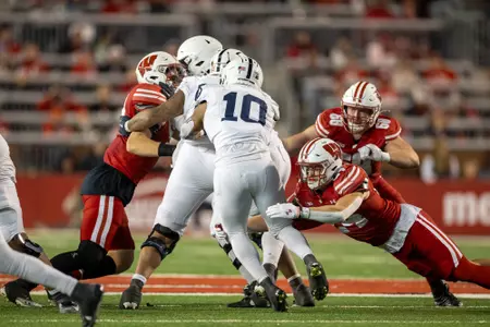 Wisconsin Badgers defensive back Hunter Wohler (24) makes a tackle during a Big Ten Conference NCAA college football game against the Penn State Nittany Lions, Saturday, Oct. 26, 2024, in Madison, Wis. The Nittany Lions won 28-13. (Photo by David Stluka/Wisconsin Athletic Communications)