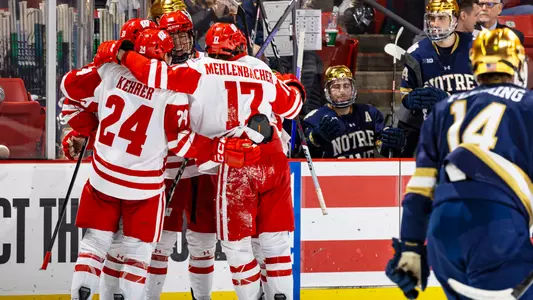 Wisconsin celebrates scoring a goal against Notre Dame at the Kohl Center