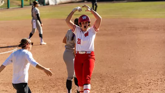 Ellie Hubbard celebrates a double against Louisville