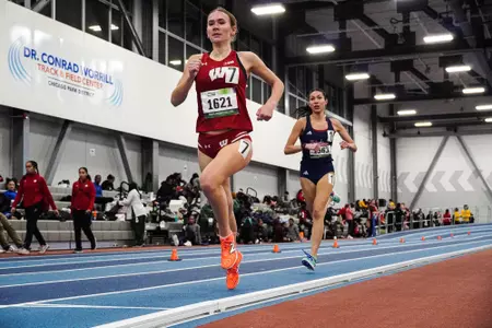Maggie McEllistrem races at Gately Stadium