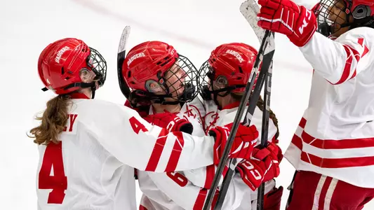 Badgers celebrate a goal on 2.9.25 against Minnesota at LaBahn Arena