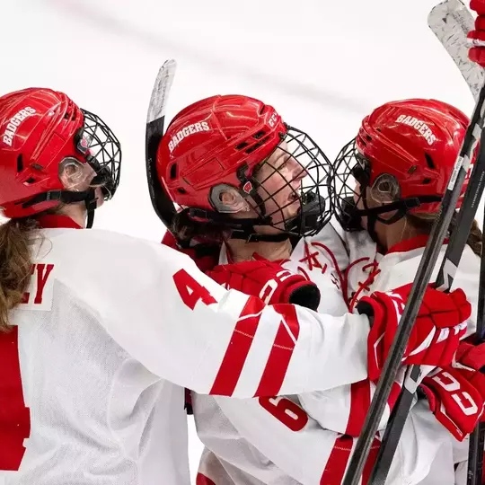 Badgers celebrate a goal on 2.9.25 against Minnesota at LaBahn Arena