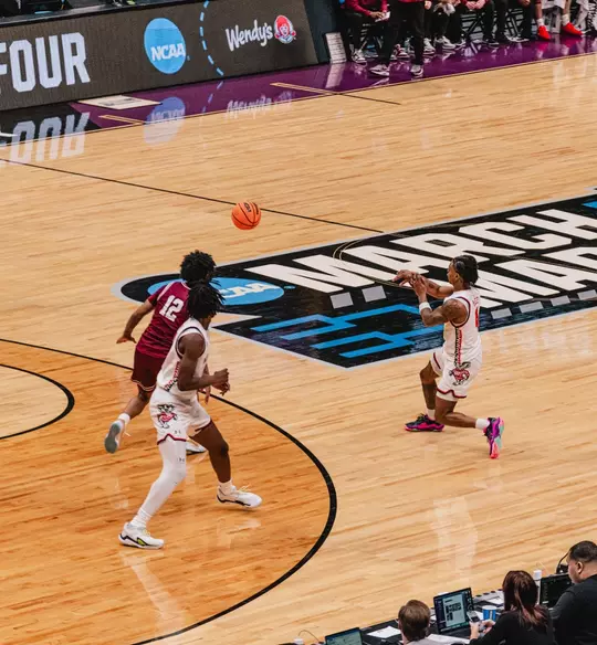 Kamari McGee passes the ball against Montana