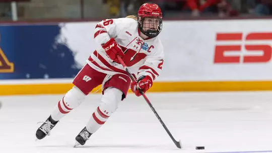 Casey O'Brien competes against Minnesota in the Frozen Four.