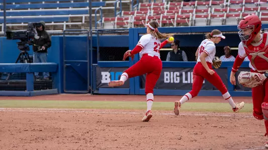 Hilary Blomberg throws out runner against Michigan