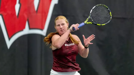 Ellison Reynoldson hits tennis ball