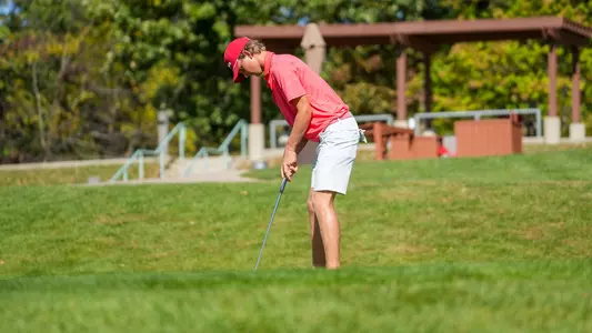 William Harned putting