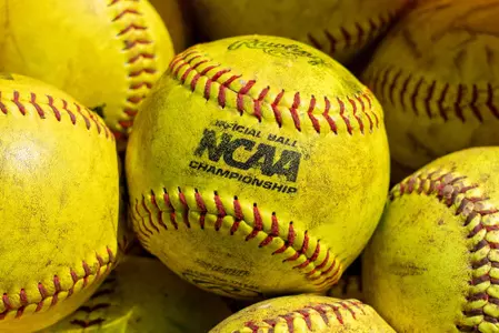 Close up on softballs in bucket