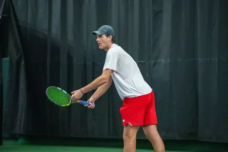 Collin Beduhn prepares to serve