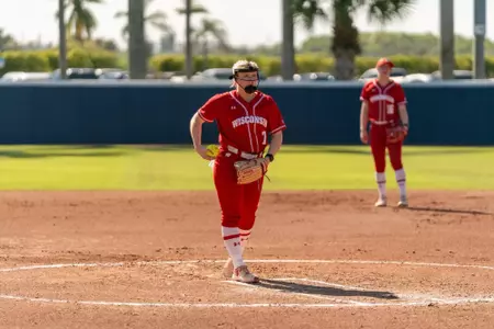 Kendra Lewis steps on the mound in a game against Kansas
