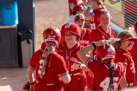 Eden Dempsey celebrates a grand slam against Kansas