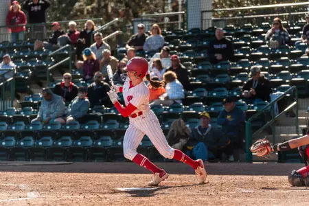 Rylie Crane puts a ball in play against Louisville
