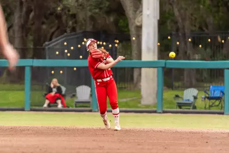 Hannah Conger fields the ball against Troy