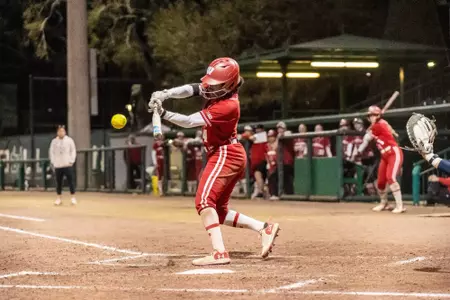 Emma King hits a pitch against Kent State