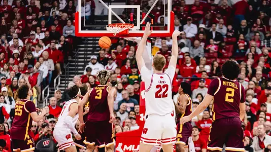 Steven Crowl hits a shot against Minnesota