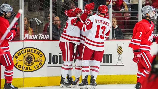 Badger men's hockey celebrates scoring a goal against Ohio State at the Kohl Center