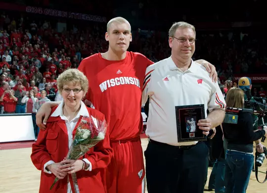 MADISON, WI - MARCH 5: Center Greg Stiemsma #34 of the Wisconsin Badgers with his parents prior to the game against the Penn State Nittany Lions at the Kohl Center on March 5, 2008 in Madison, Wisconsin. Wisconsin beat Penn State 77-41. (Photo by David Stluka)