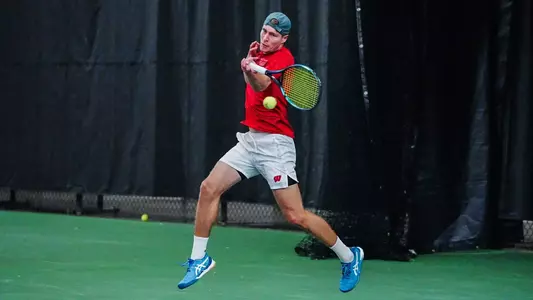 Oliver Olsson hits a forehand shot