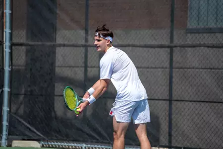 Patrik Meszaros prepares to serve