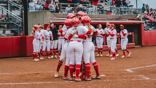 Emmy Wells celebrates her grand slam against Indiana