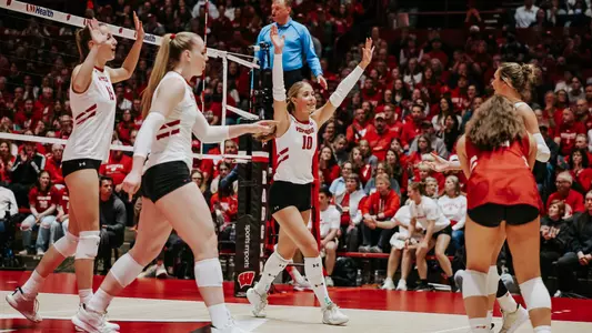 Madison Quest celebrates in spring match vs Marquette