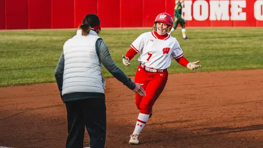 Kendra Lewis rounds third base after hitting a home run against NDSU