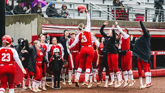 Emily Bojan celebrates a home run against Minnesota