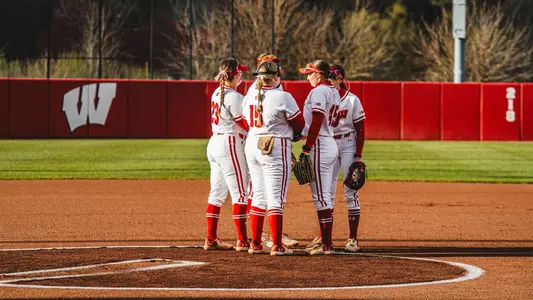 The Badgers meet at the mound in the third game of their Minnesota series