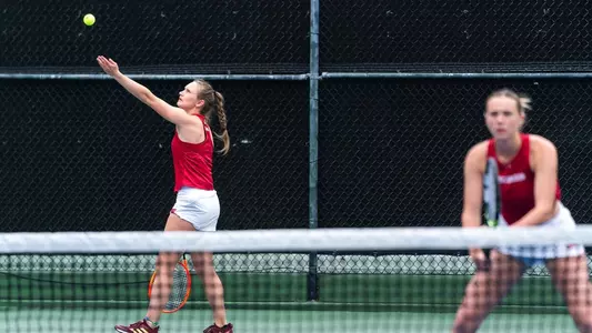 Jacobson serves vs. Penn State