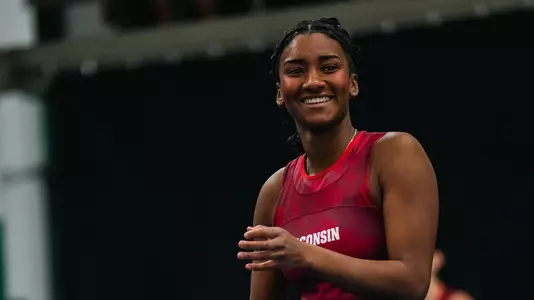 Johnson smiles after winning a point