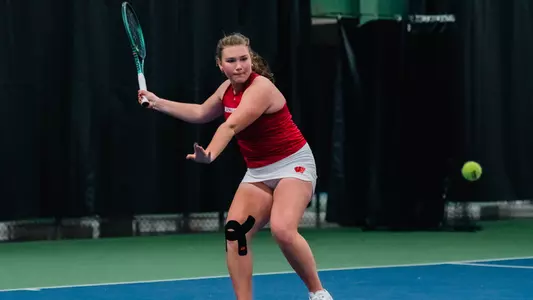 Ekaterina Ivanova returns ball