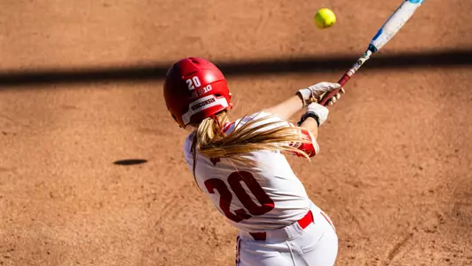 Molly Schlosser hits a double against Washington on April 5