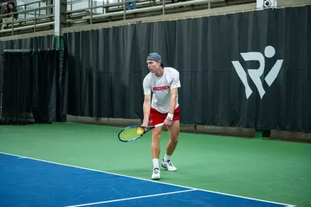 Oliver Olsson prepares to serve