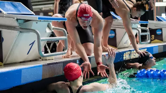 Phoebe Bacon high fives teammate at 2025 NCAAs