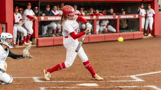 Brooke Kuffel hits a ball against Omaha on senior day