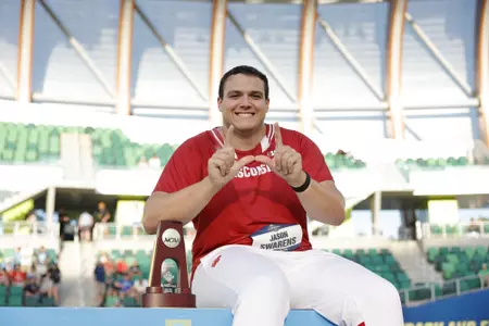 Jason Swarens celebrates after being crowned a champion at the NCAA Outdoor Championships.