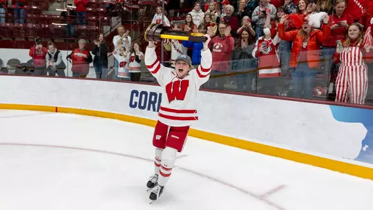 Casey O'Brien with the NCAA Trophy