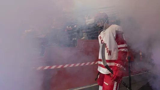 Logan Hensler walking through fog